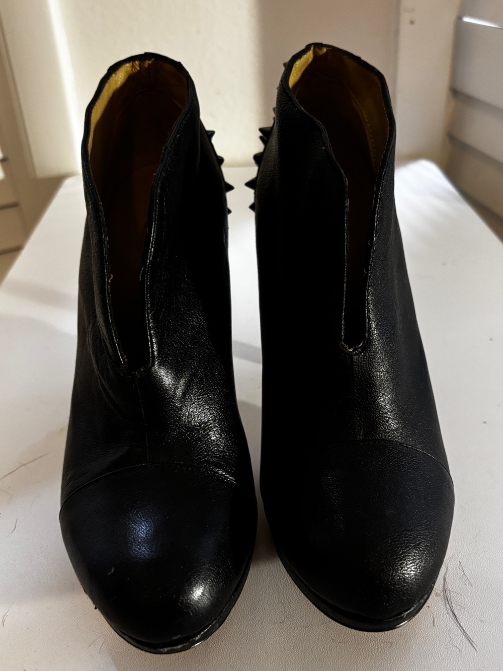 Vintage BCBGMaxAzria Black Leather Ankle Booties with Rear Stud Detail